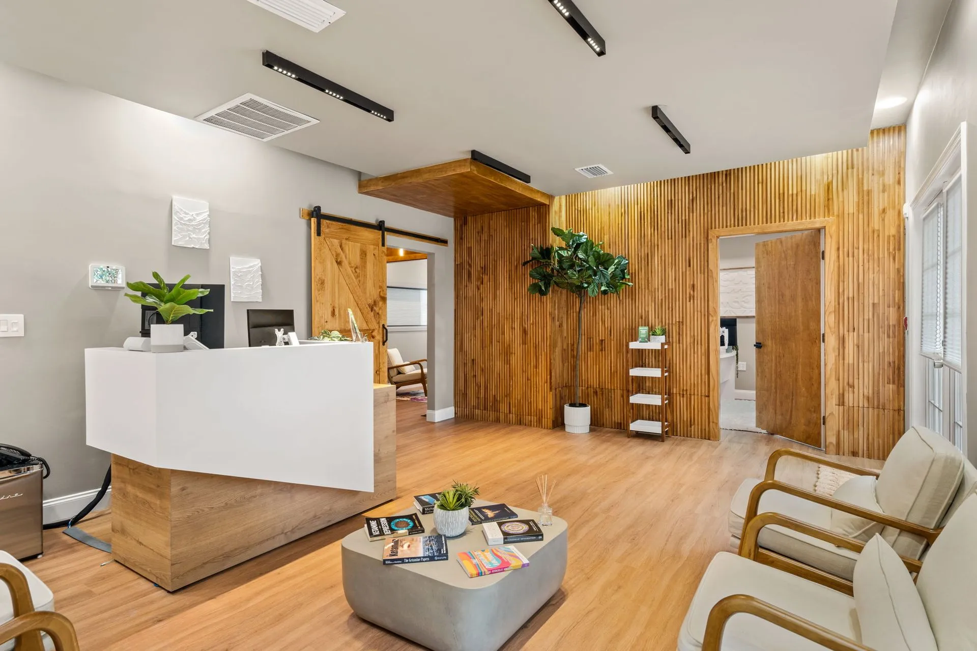 Renovated commercial reception area with wood finishes